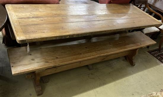 A Victorian style rectangular pine refectory table and a two bench seats, table width 203cm, depth 69cm, height 76cm